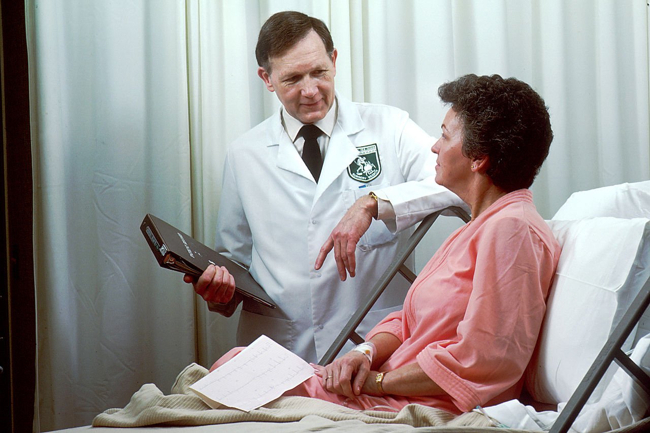 Oncology doctor checkingup on patient