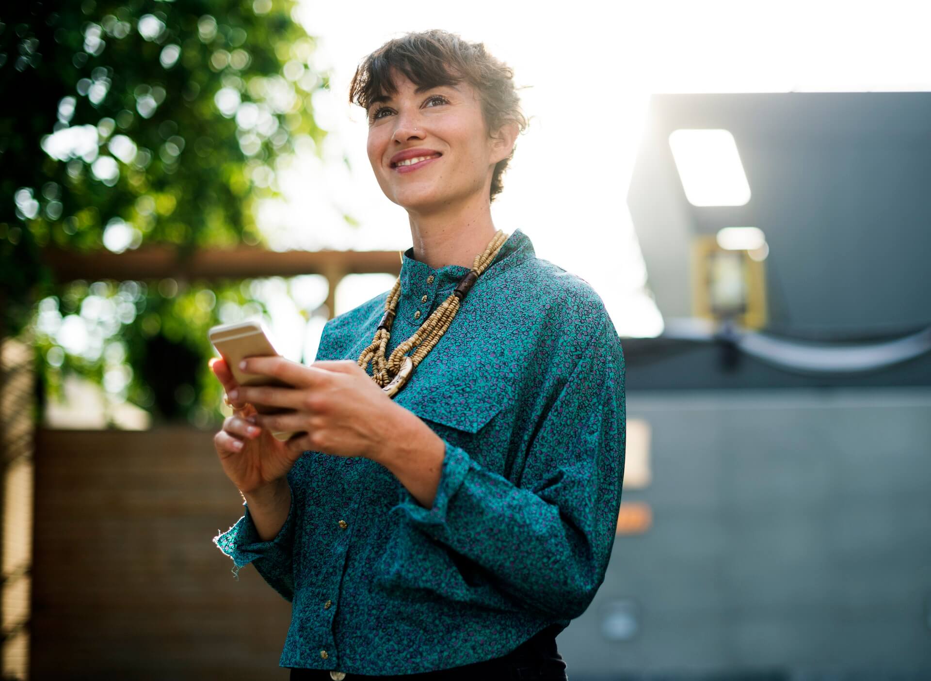 Woman holding her phone