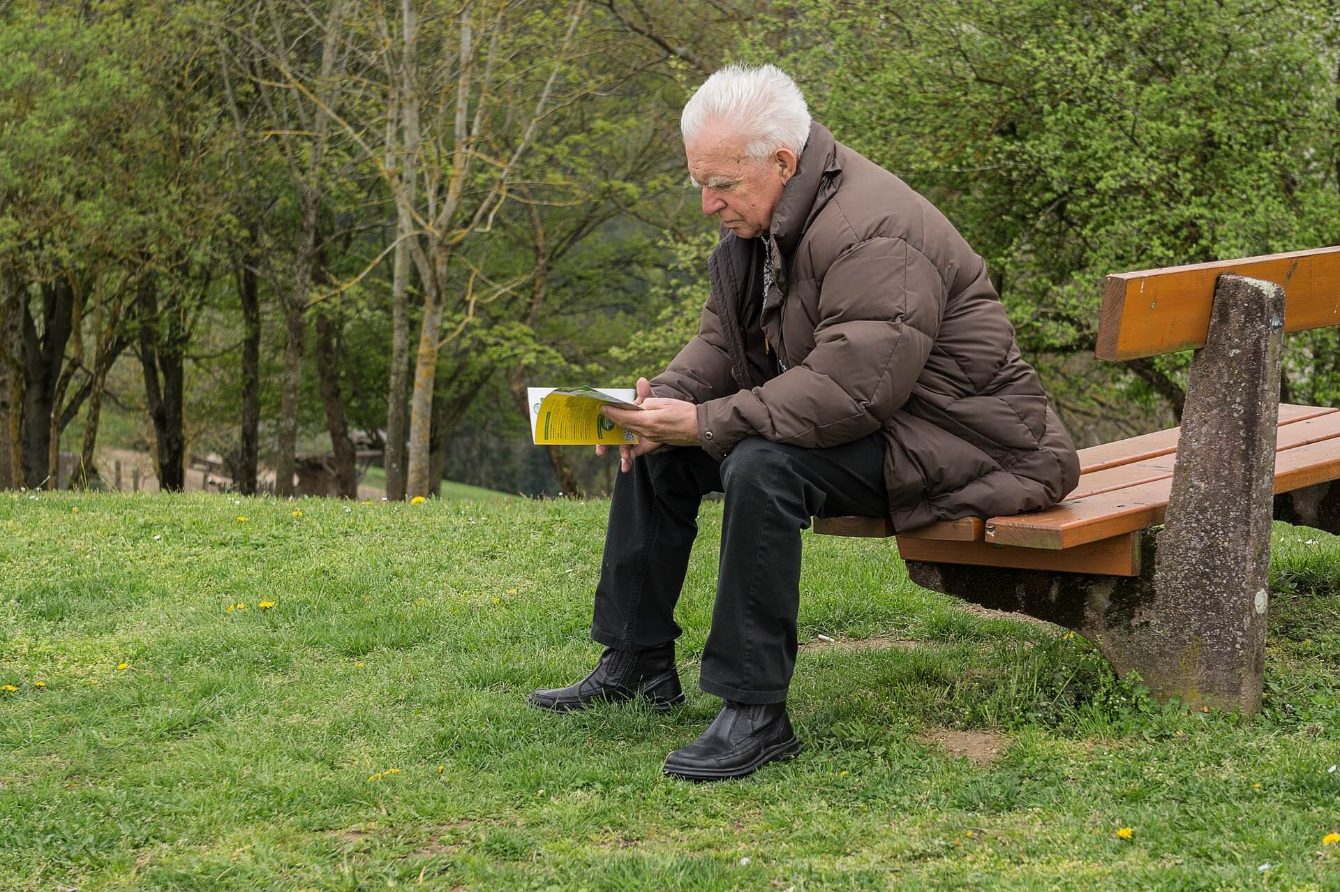 Elderly man reading