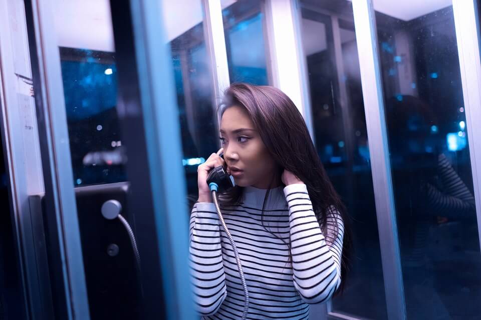 A girl talking on the phone.