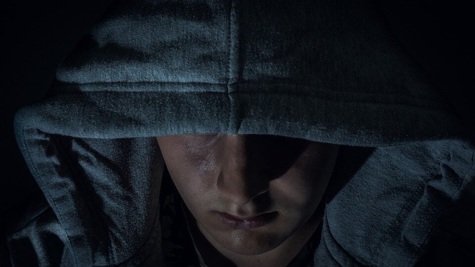 Man wearing a hoodie, Black Death crime group