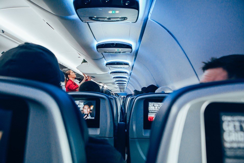To avoid flight delays, sometimes, flight crews allow a passenger to put in an extra luggage inside the overhead bins.