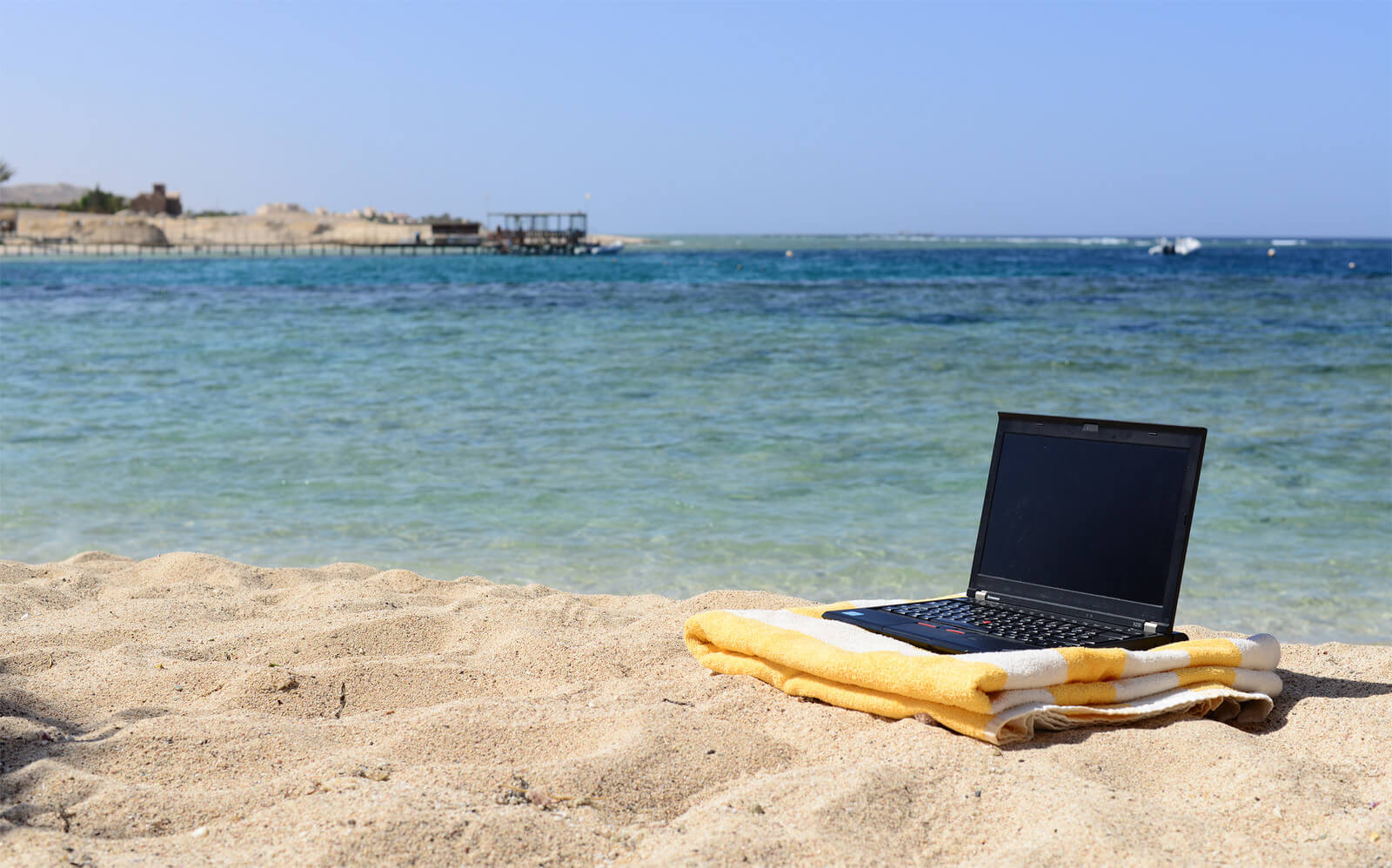 laptop by beach