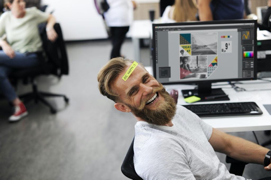 This picture show a happy man while working