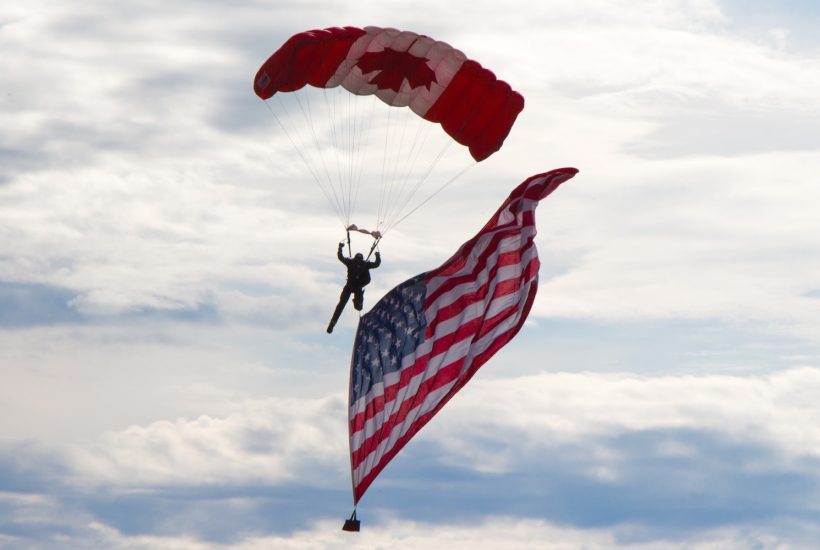 This picture show a person with an American flag.