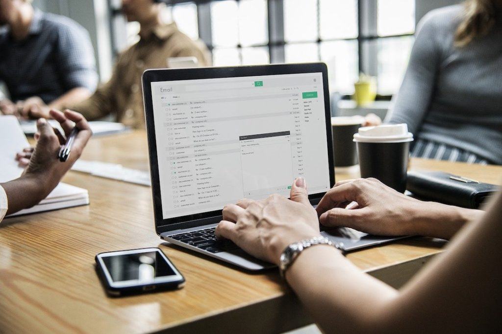 This picture show a girl checking her email.