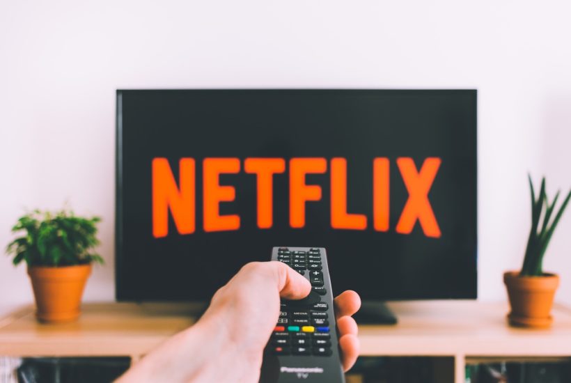 This picture show a person using Netflix.