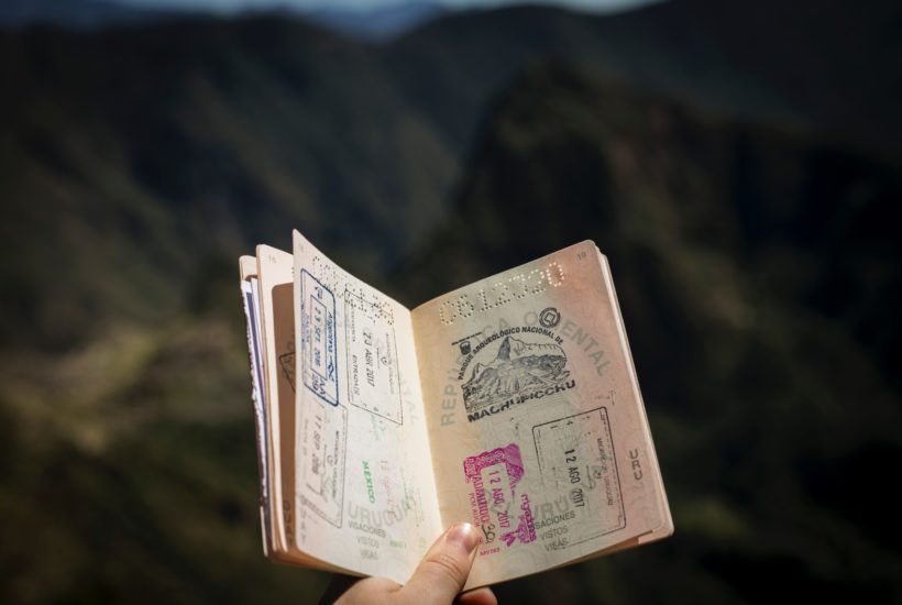 This picture show a passport with an arrival visa on it.