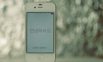 This picture show an iPhone with Korean text on it.