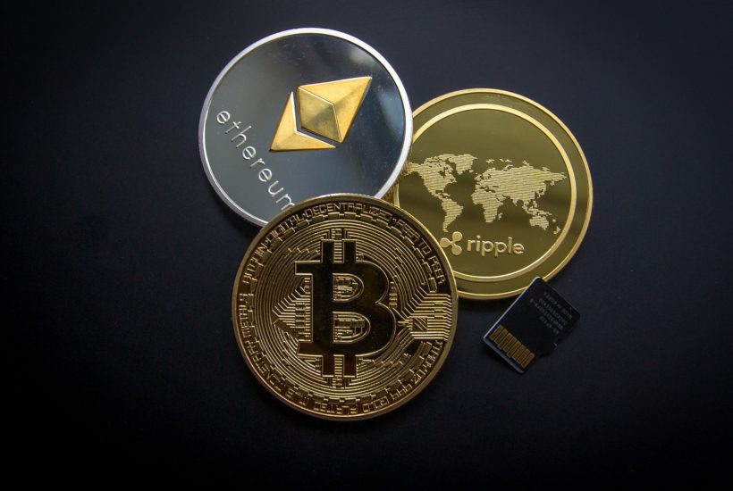 This picture show a couple of cryptocurrencies stacked up.