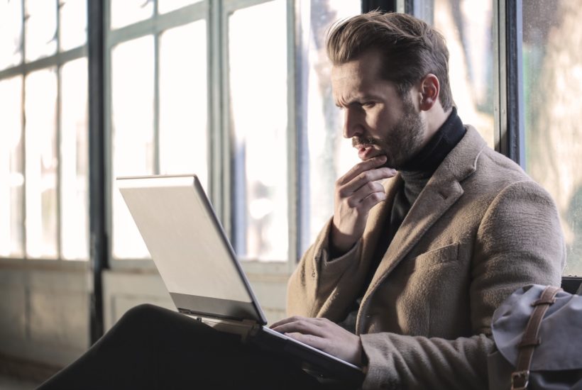 This picture show a person using a laptop.