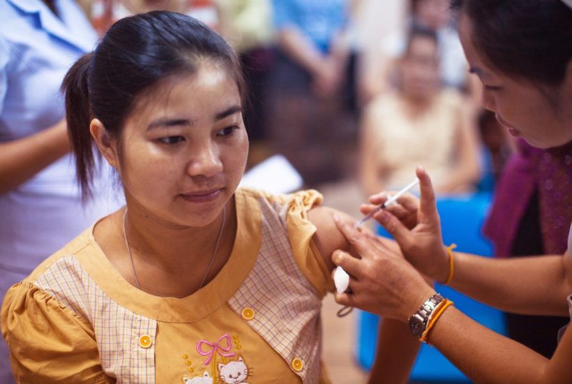 This picture show a person receiving a vaccine.