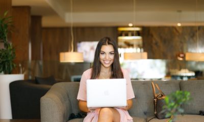 This picture shows a women using a laptop.