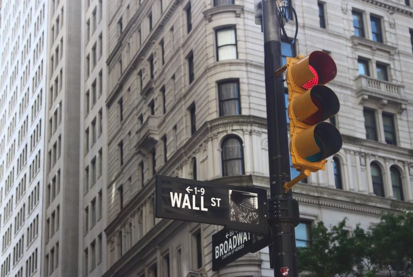 This picture show the wall street sign.