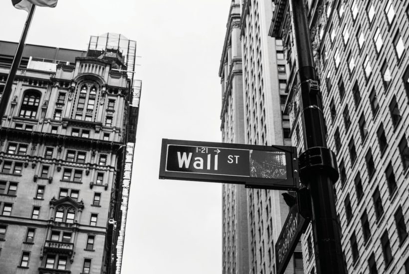 This picture show the wall street sign.