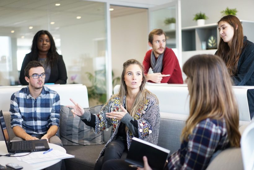 This picture show a group of people on a meeting.