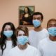This picture show a group of health workers with facemasks.