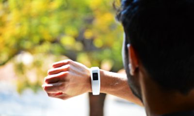 This picture show a person wearing a fitness tracker.