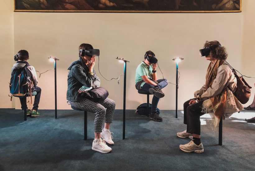 This picture show a group of people using VR sets.