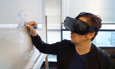 This picture show some writing on a board with a VR set.