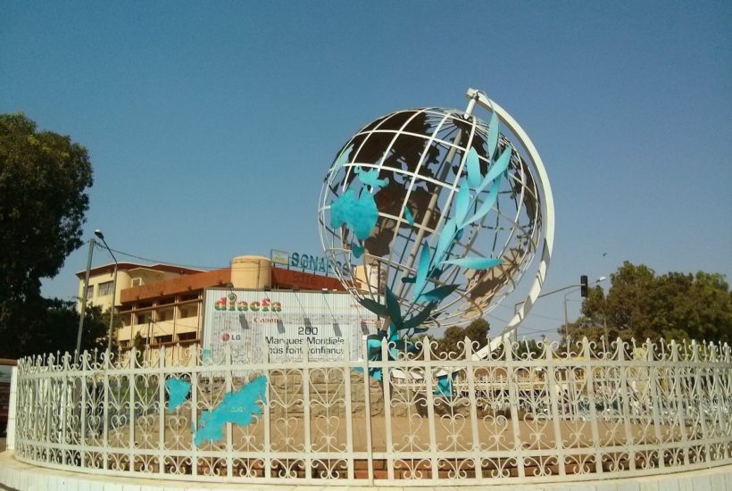 This picture show a globe monument.