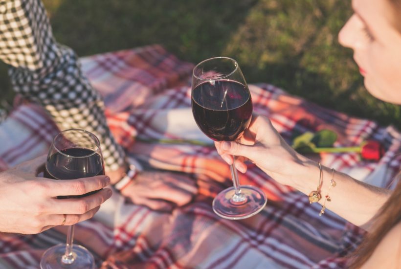 This picture show two people drinking wine.