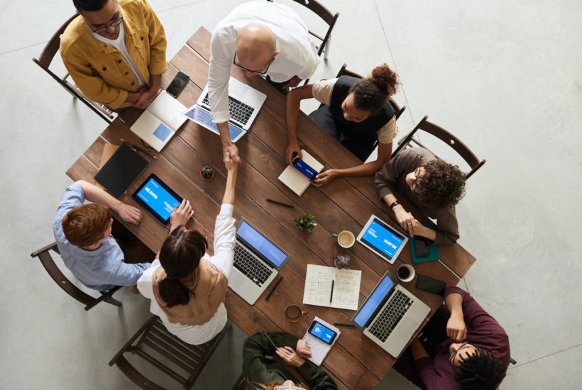 This picture show a group of people in a meeting.