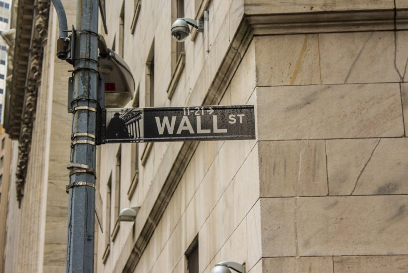 This picture show the wall street sign.