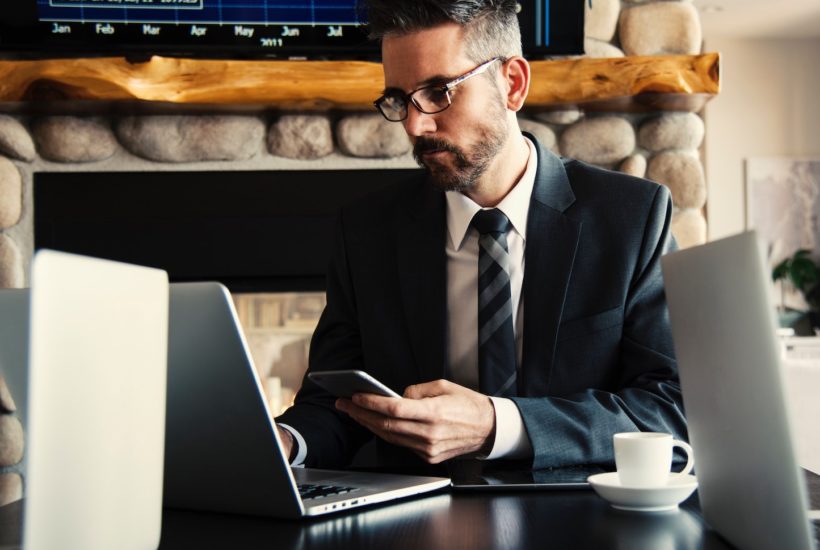 This picture show a person looking at a laptop.