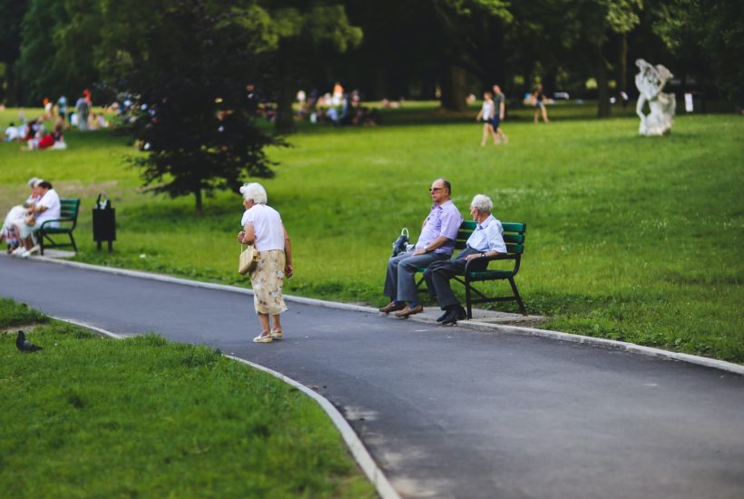 This picture show some elders on a park.