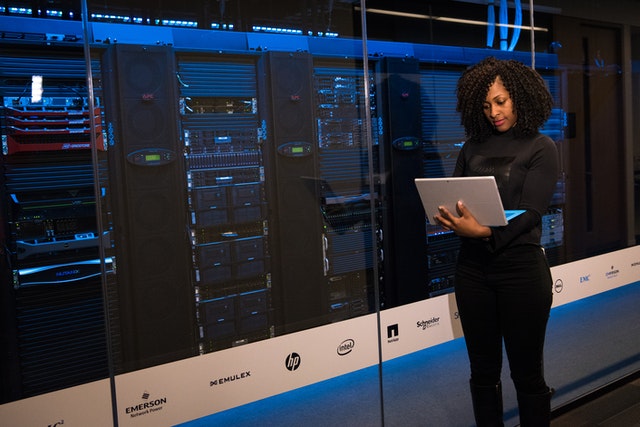 Business woman configuring dedicated servers